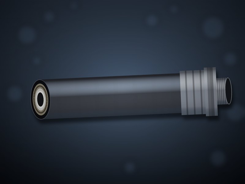 Cut edge of a chemical hose assembly showing cover, textile reinforcement, liner and hollow bore beside a crimped end fitting