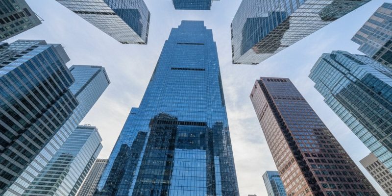 low-angle-modern-skyscrapers-financial-district-glass-buildings